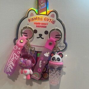 NWT Kawaii (2) Piece Double Liquid Shaky Key Chain with bag charm.